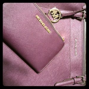 Purple Michael Kors tote with wallet